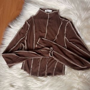 Brown cropped long sleeve turtle neck with ribbed detailing